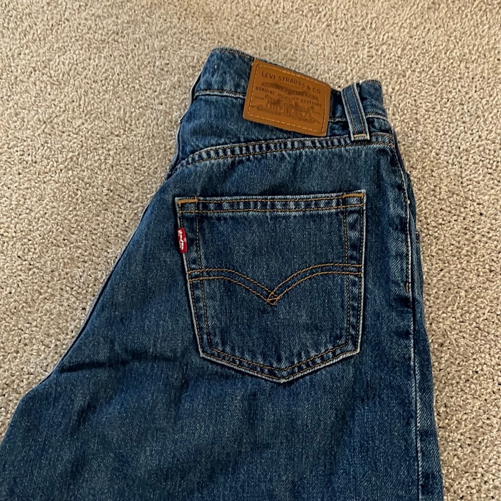 ballon leg dark wash cut off levis